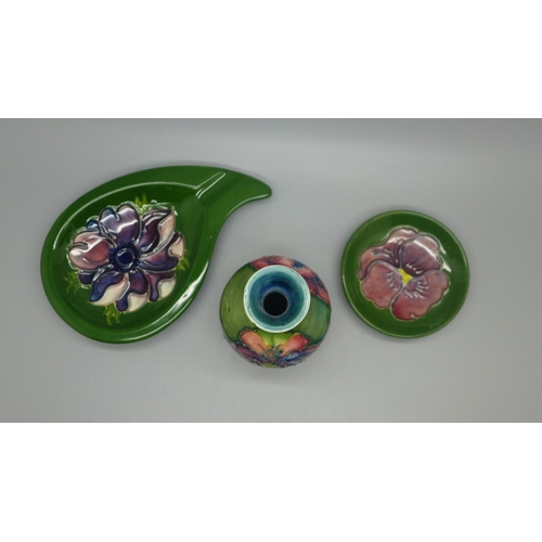 637 - A Moorcroft ashtray, pin dish and vase, vase with small chip to rim