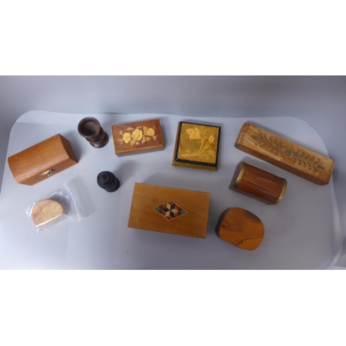 673 - Eight assorted wooden boxes and other treen