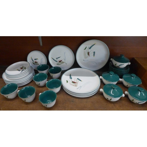 674 - Denby Greenwheat tea and dinnerwares, including five dinner plate, six smaller plates, five side pla... 