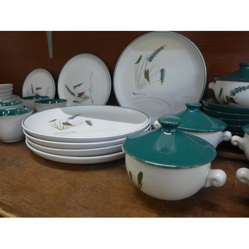 674 - Denby Greenwheat tea and dinnerwares, including five dinner plate, six smaller plates, five side pla... 