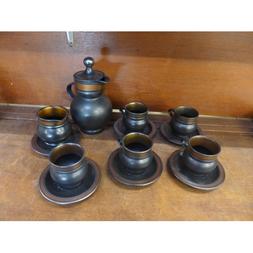 680 - A Purbeck coffee set; five cups, six saucers, milk jug, coffee pot and sugar bowl