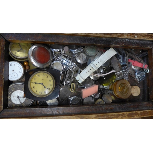 681 - Assorted clock and watch spares including a tortoiseshell mounted 8-day clock, a/f