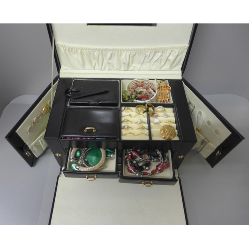 692 - A collection of costume jewellery in a jewellery box