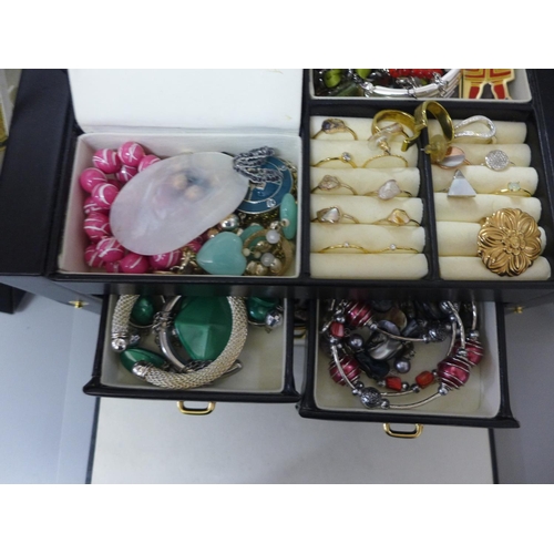 692 - A collection of costume jewellery in a jewellery box