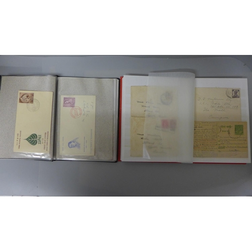 698 - Stamps:- India stamps, postal history and first day covers in two albums