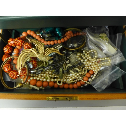 714 - A box of costume jewellery including two 9ct gold brooches, 2.9g