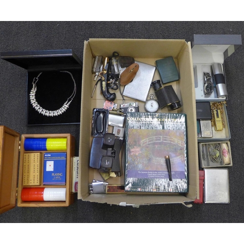 719 - A collection of items including cigarette cases, card cases, lighters, a slide viewer, a costume nec... 