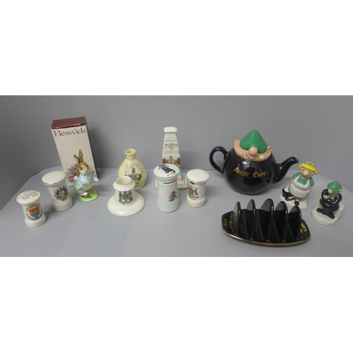 724 - A collection of mixed china including a Wade Andy Capp teapot, toast rack, salt and pepper shakers, ... 