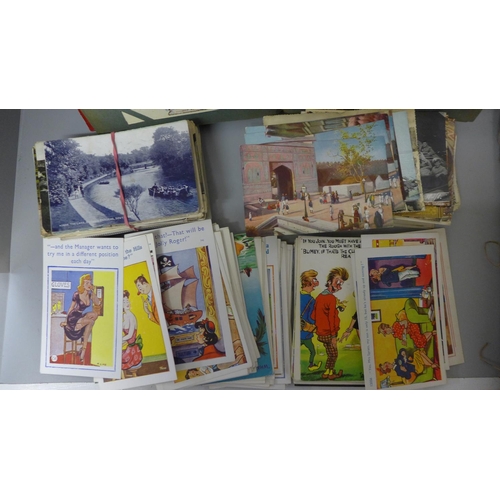 727 - Two postcard albums and a collection of loose postcards, early 20th Century onwards