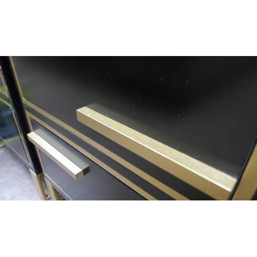 1463 - A pair of black and gold bedside chests