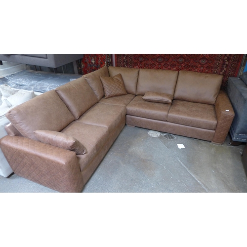 1499 - A dark tan upholstered corner sofa