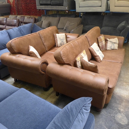 1507 - A County brown leather effect buttoned and studded four and three seater sofas