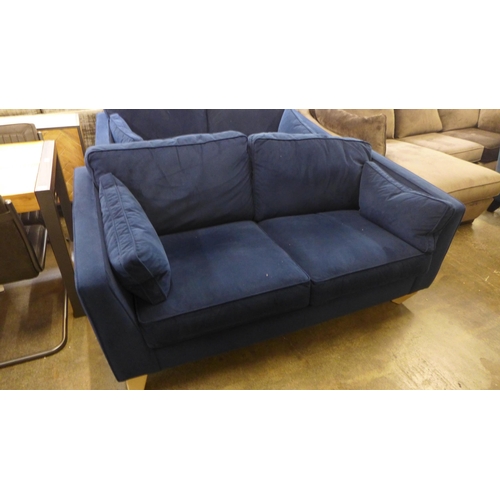 1537 - A pair of Vincent deep ocean blue two seater sofa with washed oak feet