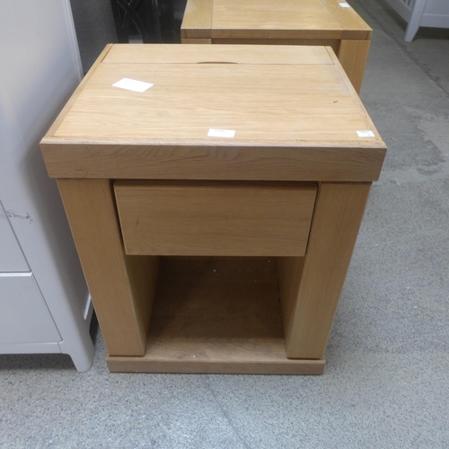 1680 - An oak square multi drawer lamp table with power and usb supply