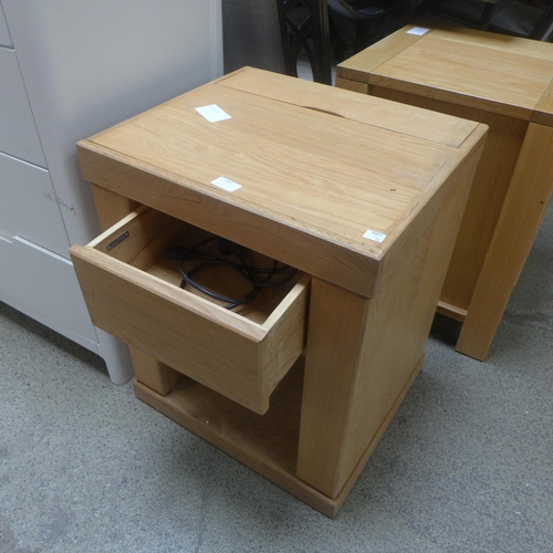 1680 - An oak square multi drawer lamp table with power and usb supply