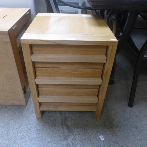 1681 - An oak three drawer bedside chest