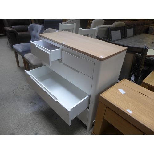 1682 - A white painted and washed oak two over three chest of drawers