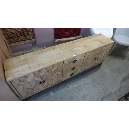 1692 - A chevron wooden four door and three drawer large sideboard