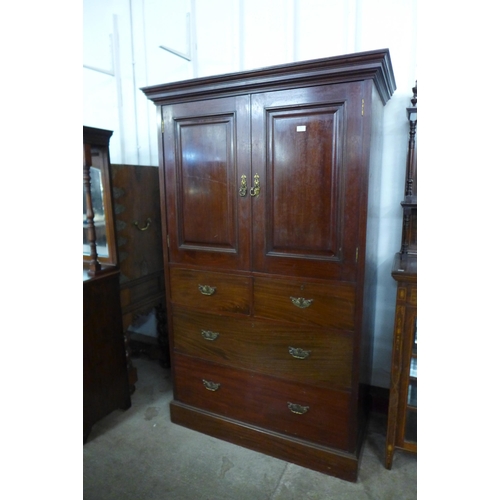 102 - A Victorian mahogany bachelors wardrobe