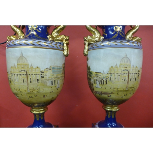 104 - A pair of large Italian style cobalt blue porcelain vases and covers, decorated with a view of St. P... 