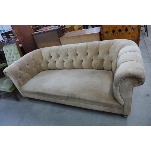 118 - A sand fabric Chesterfield settee