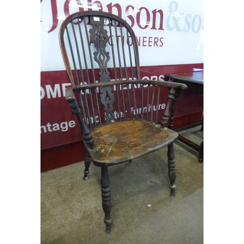 12 - A 19th Century elm and yew highback Windsor chair, attributed to Gabbitas workshop, Worksop, a/f