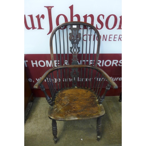 12 - A 19th Century elm and yew highback Windsor chair, attributed to Gabbitas workshop, Worksop, a/f