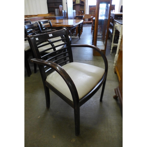 124 - A set of seven Art Deco beech chairs