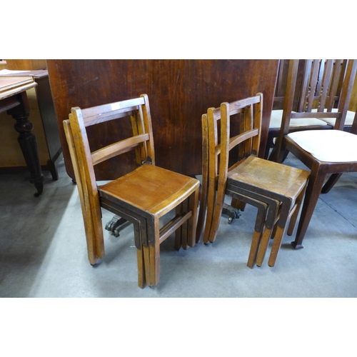 126 - A set of six beech children's stacking chairs