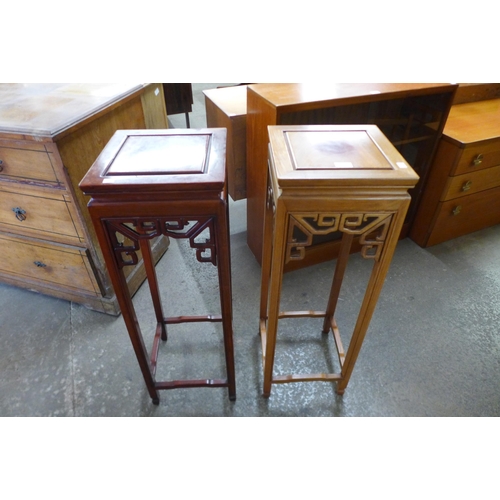 130 - A pair of Chinese hardwood jardiniere stands