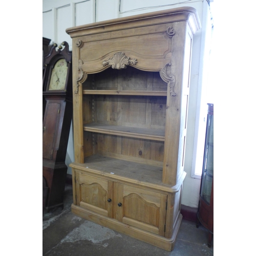 132 - A French pine open bookcase