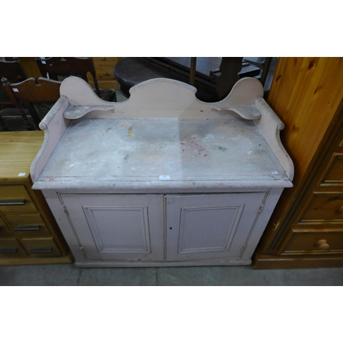 146 - A Victorian painted pine washstand