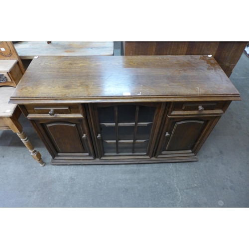 152 - An oak sideboard