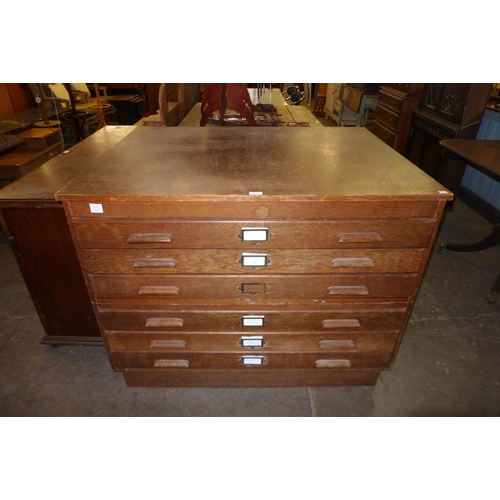 153 - An oak plan chest