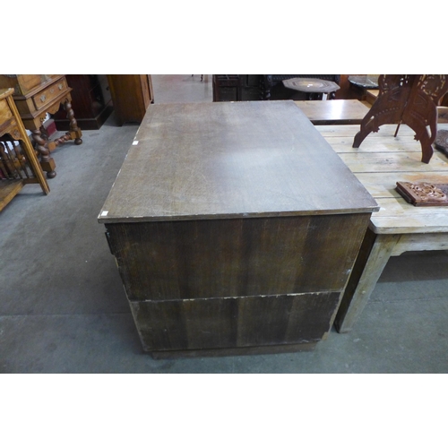 153 - An oak plan chest