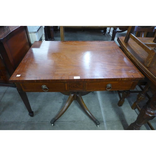 168 - A George IV mahogany two drawer library table