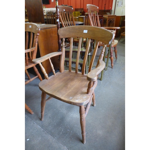 171 - A set of seven beech elbow chairs