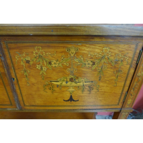 26 - An Edward VII Sheraton Revival marquetry inlaid satinwood side cabinet