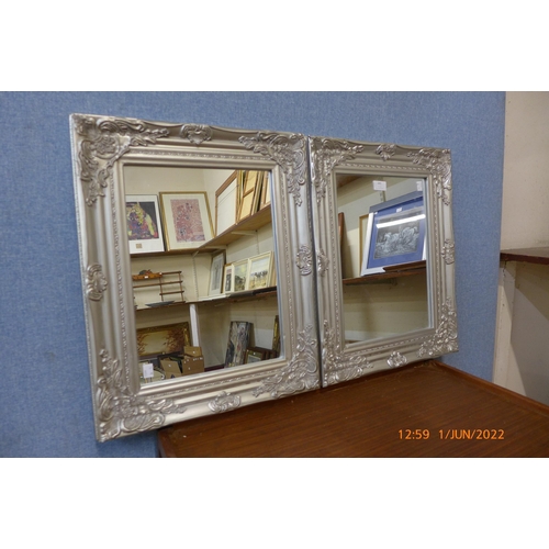 283 - A pair of silver effect framed mirrors