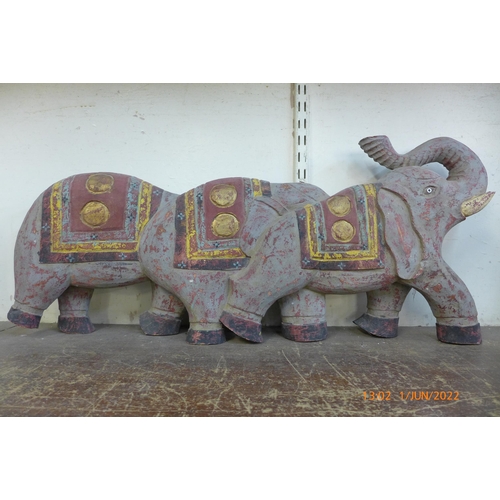 286 - An Indian painted figure of elephants