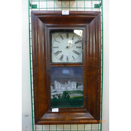 295 - An American wall clock with transfer printed glass front, The New Wellington College, Sandhurst, Eng... 