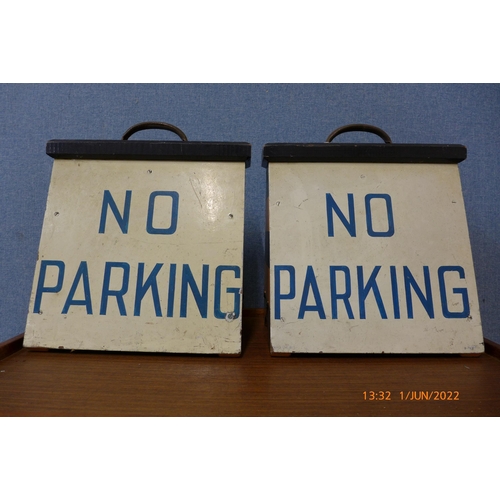 313 - A pair of vintage painted wooden No Parking signs