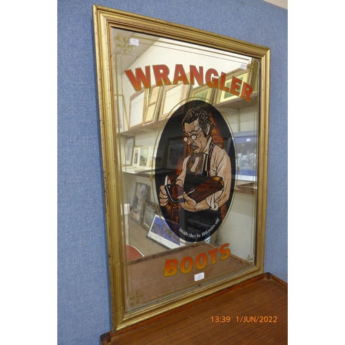 317 - A gilt framed Wrangler Boots advertising mirror