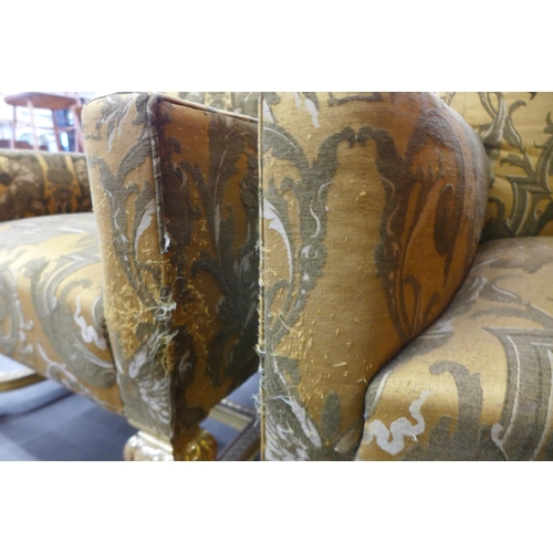 39 - A pair of French Louis XV style giltwood and upholstered armchairs