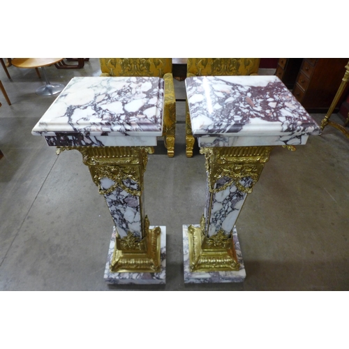 40 - A pair of French Louis XV style marble and gilt metal mounted pedestals