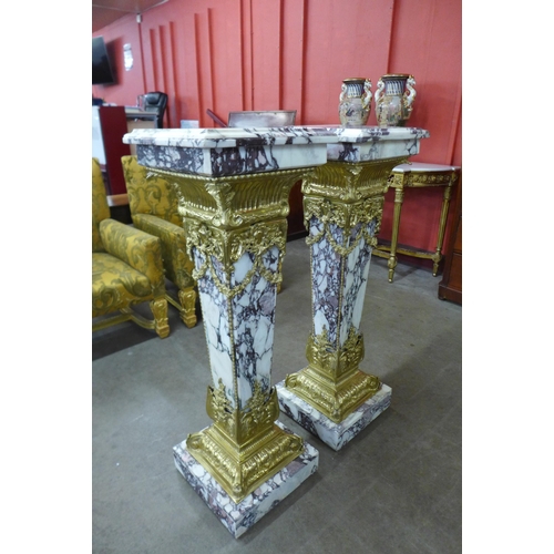 40 - A pair of French Louis XV style marble and gilt metal mounted pedestals