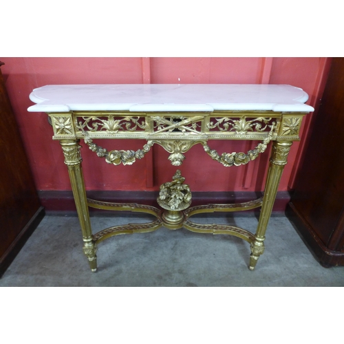 5 - A French Louis XV style giltwood and marble topped console table