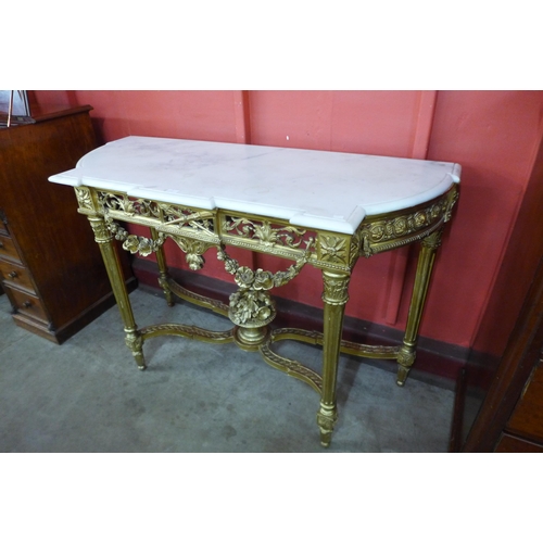 5 - A French Louis XV style giltwood and marble topped console table