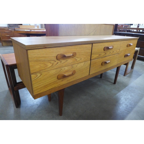 58 - A teak sideboard