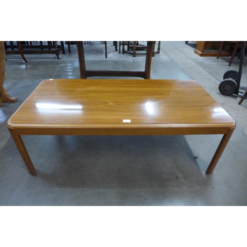 65 - A teak coffee table